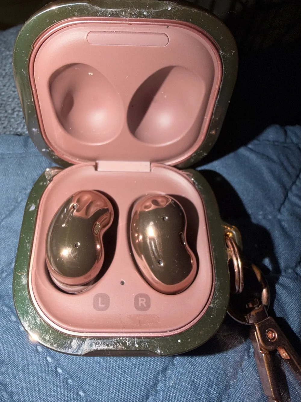 Samsung Earbuds with Charging Case in Rose Copper and Carrying case included.